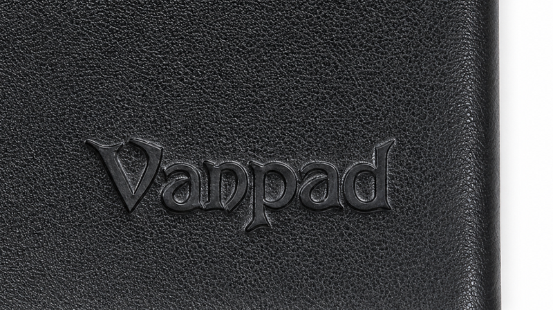 Pressed black logo on textured notebook cover